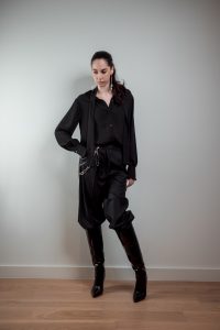 JAGYCH AW 25 ESSENTIALS BRUTAL REFINEMENT BYRON SHIRT IN BLACK CRYSTAL CROSS EARINGS TROUSERS CHAIN