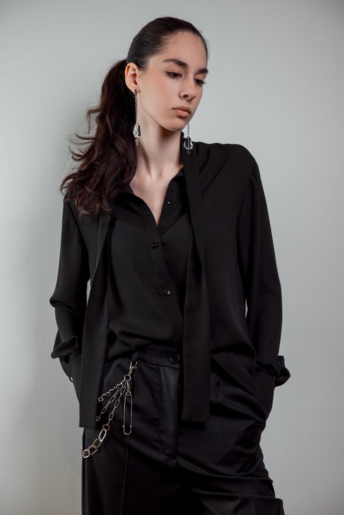 JAGYCH AW 25 ESSENTIALS
BRUTAL REFINEMENT

BYRON SHIRT IN BLACK
CRYSTAL CROSS EARINGS
TROUSERS
CHAIN