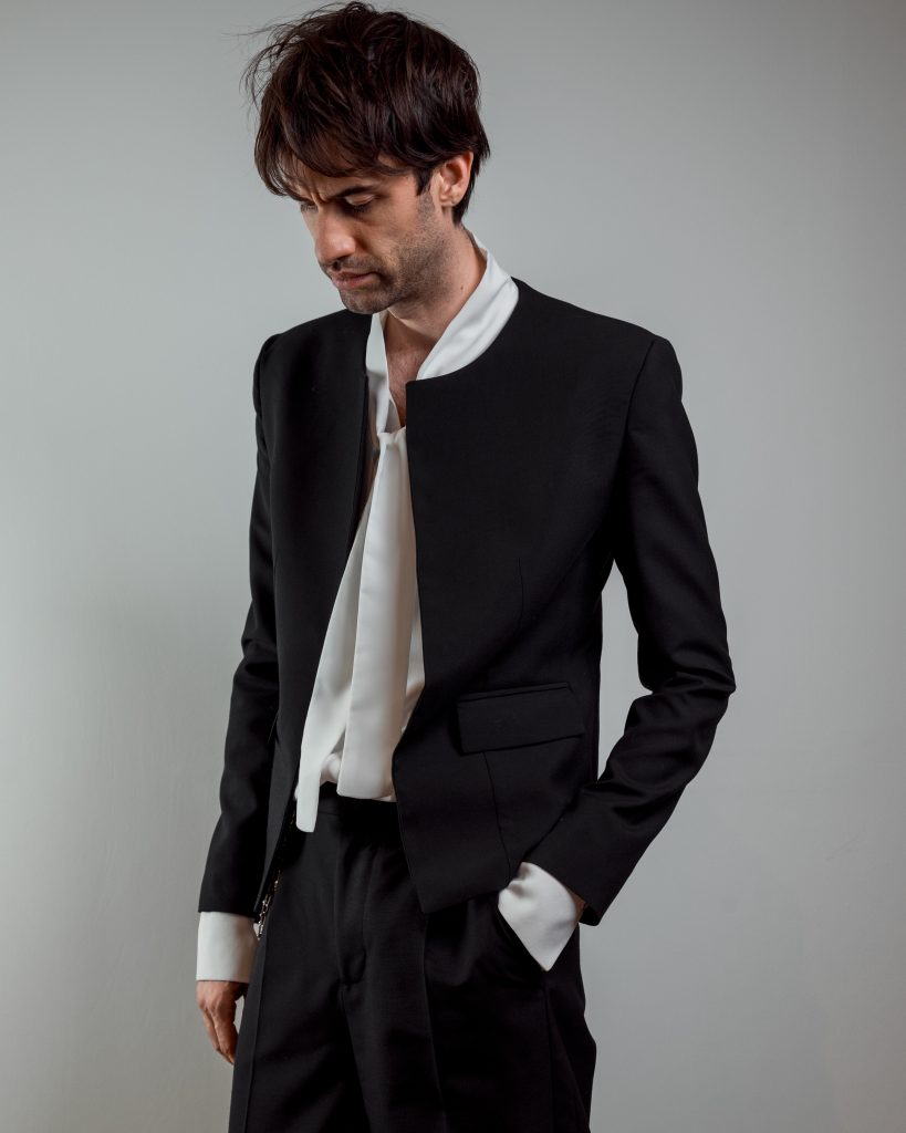 JAGYCH AW 25 ESSENTIALS BRUTAL REFINEMENT OSCAR WOOL JACKET BYRON SHIRT IN WHITE TROUSERS CHAIN