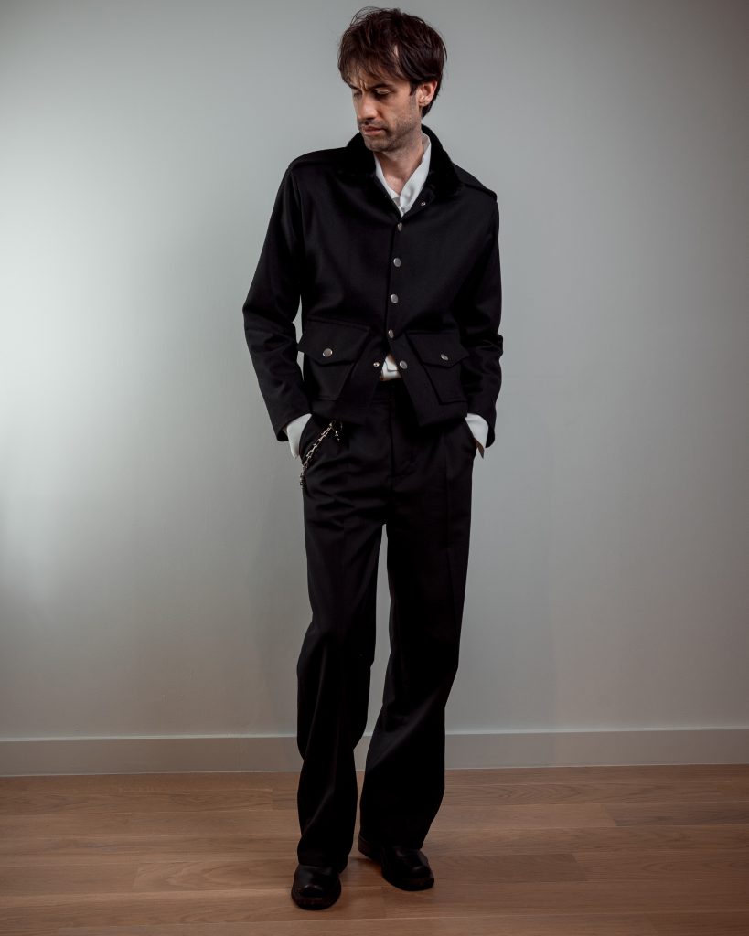 JAGYCH AW 25 ESSENTIALS BRUTAL REFINEMENT WOOL JACKET WITH FAUX FUR COLLAR BYRON SHIRT IN WHITE TROUSERS CHAIN